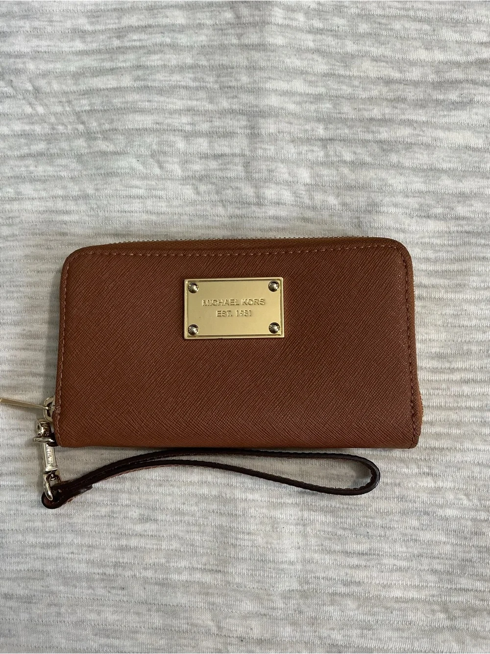 Michael Kors Saffiano Leather Wristlet in Chestnut with Gold Plaque